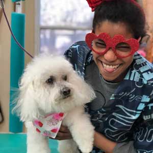 Cedar Lane employee smiling for photo with patient